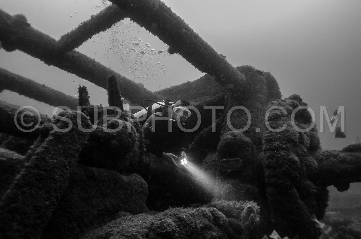 Diver in front of the Ville de Rochefort wreck in Brittany