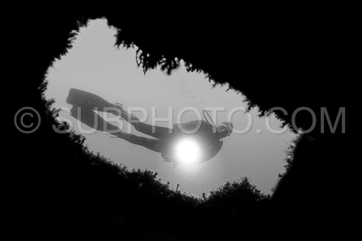 Diver in front of the Ville de Rochefort wreck in Brittany