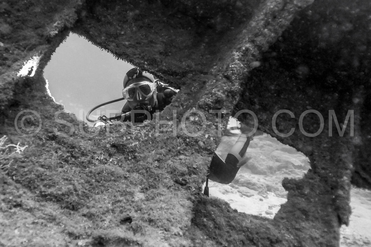 Diver in front of the Ville de Rochefort wreck in Brittany