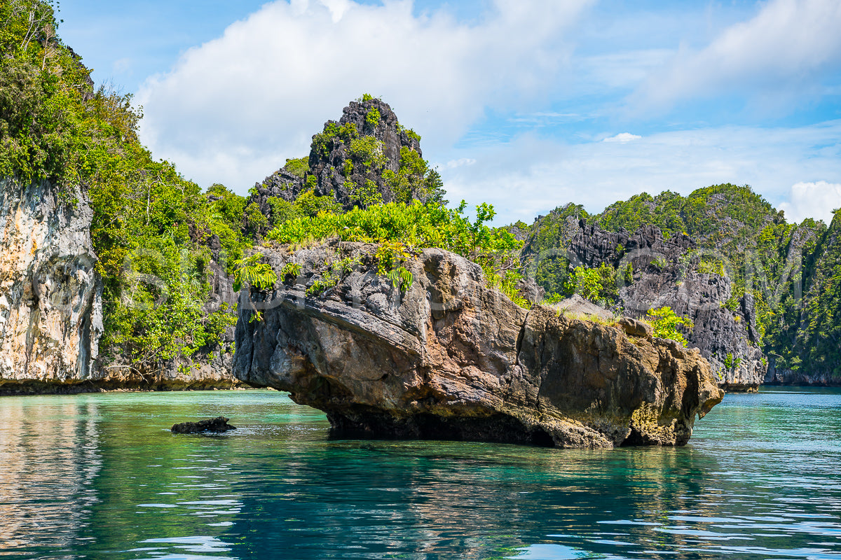 East Misool- group of small island in shallow blue lagoon water- Raja Ampat- West Papua- Indonesia