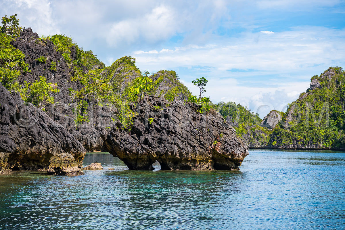 East Misool- group of small island in shallow blue lagoon water- Raja Ampat- West Papua- Indonesia