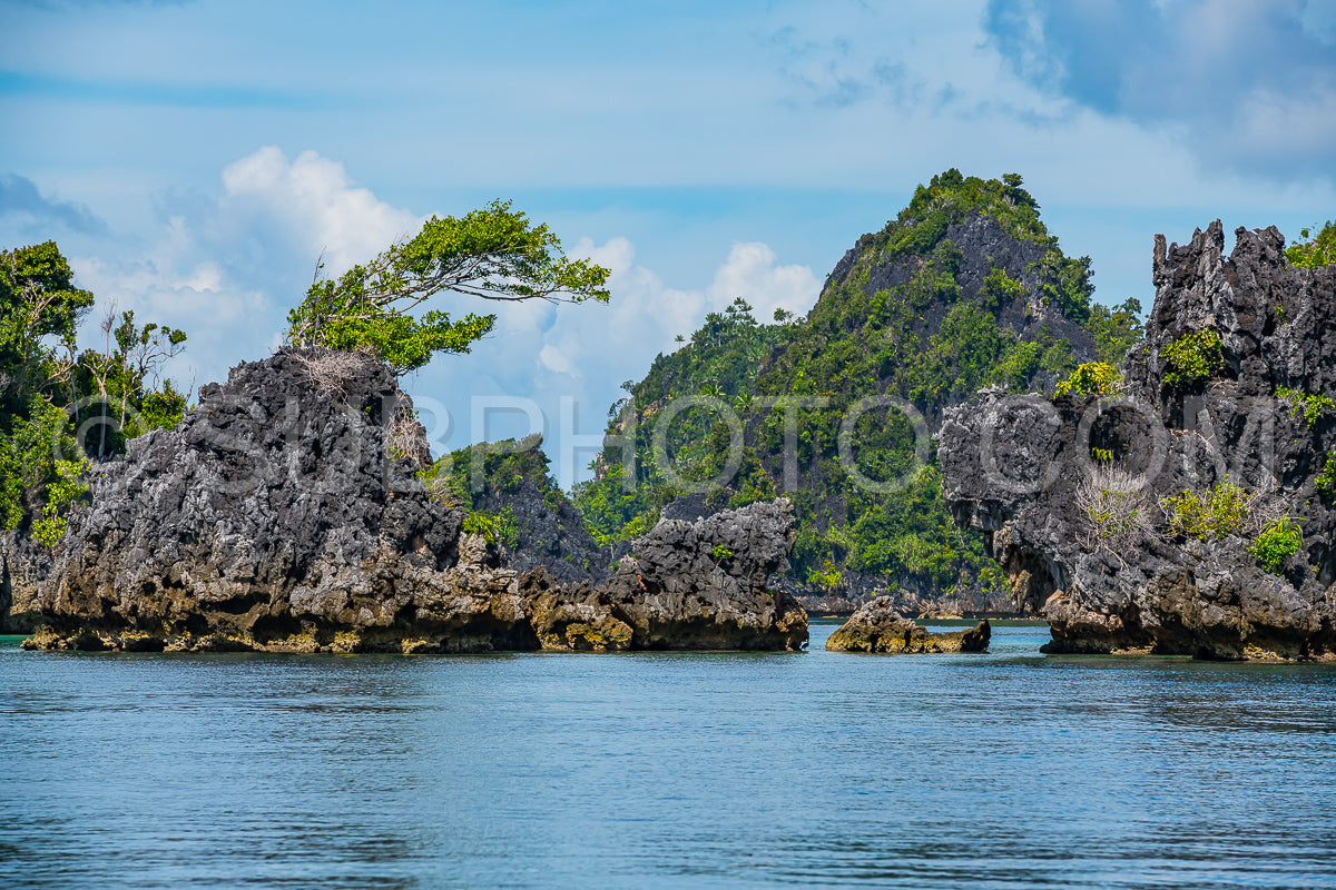 East Misool- group of small island in shallow blue lagoon water- Raja Ampat- West Papua- Indonesia
