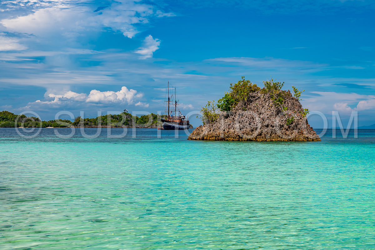 Waigeo- Kri- Mushroom Island- group of small islands in shallow blue lagoon water- Raja Ampat- West Papua- Indonesia