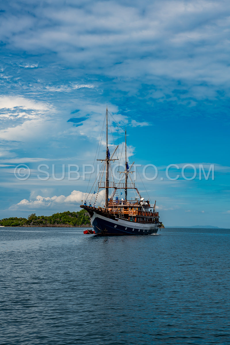 Liveaboard diving boat- Waigeo- Kri- Mushroom Island- group of small islands in shallow blue lagoon water- Raja Ampat- West Papua- Indonesia