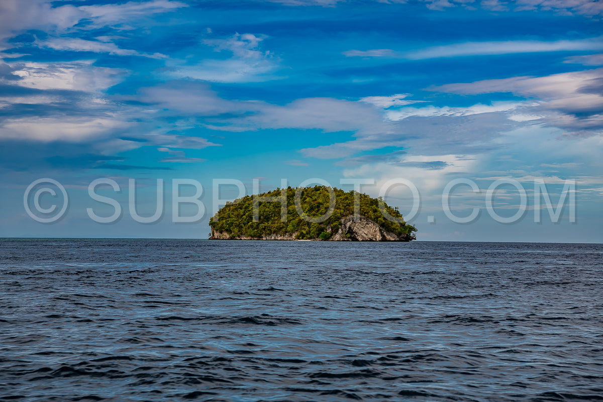 Waigeo- Kri- Mushroom Island- group of small islands in shallow blue lagoon water- Raja Ampat- West Papua- Indonesia