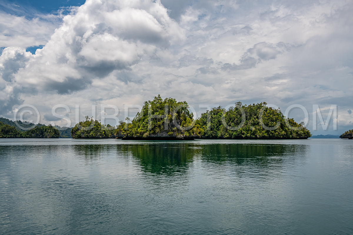 Waigeo- Kri- Mushroom Island- group of small islands in shallow blue lagoon water- Raja Ampat- West Papua- Indonesia