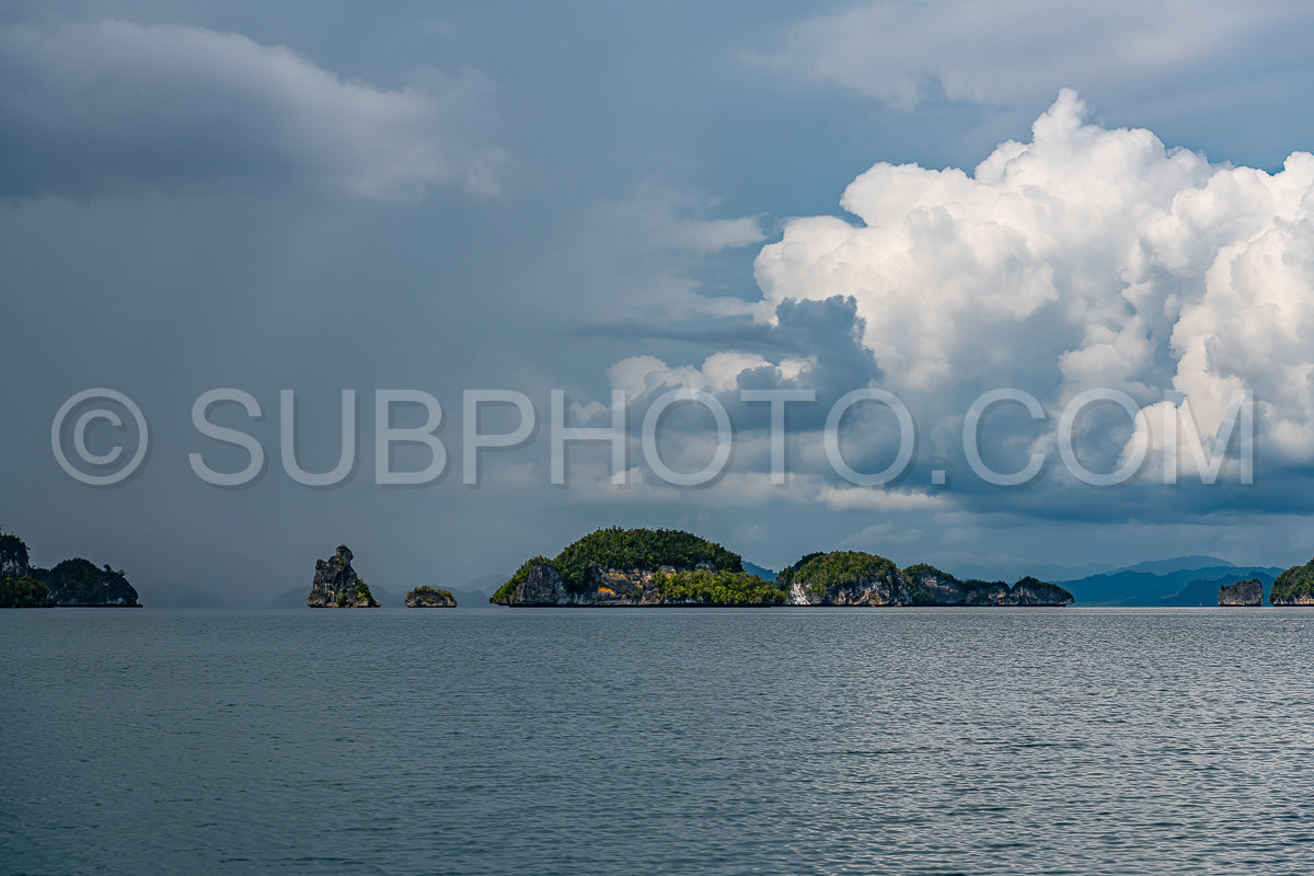 Waigeo- Kri- Mushroom Island- group of small islands in shallow blue lagoon water- Raja Ampat- West Papua- Indonesia
