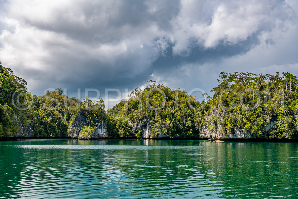 Waigeo- Kri- Mushroom Island- group of small islands in shallow blue lagoon water- Raja Ampat- West Papua- Indonesia