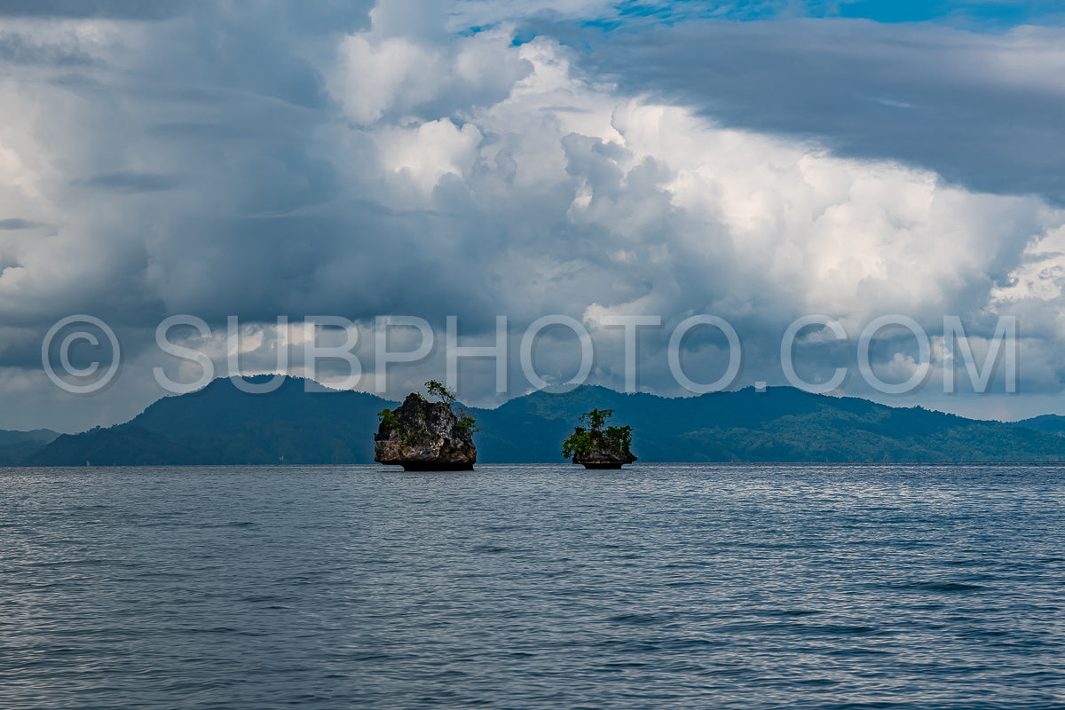 Waigeo- Kri- Mushroom Island- group of small islands in shallow blue lagoon water- Raja Ampat- West Papua- Indonesia