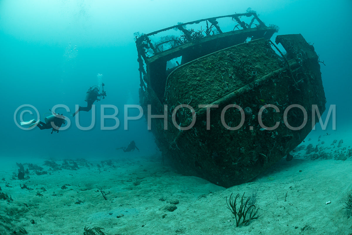 woman scuba diving on Cozumel coral reef in Mexico