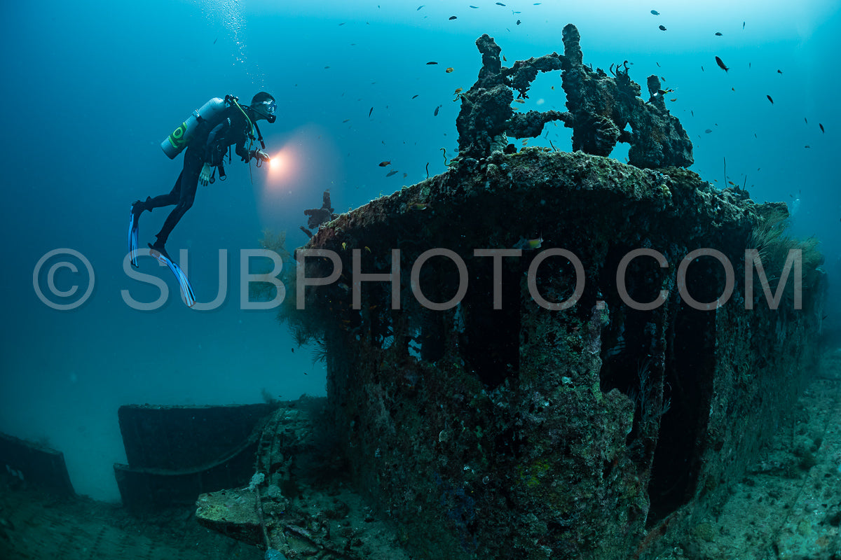 diver visiting a ship wreck in the Maldives