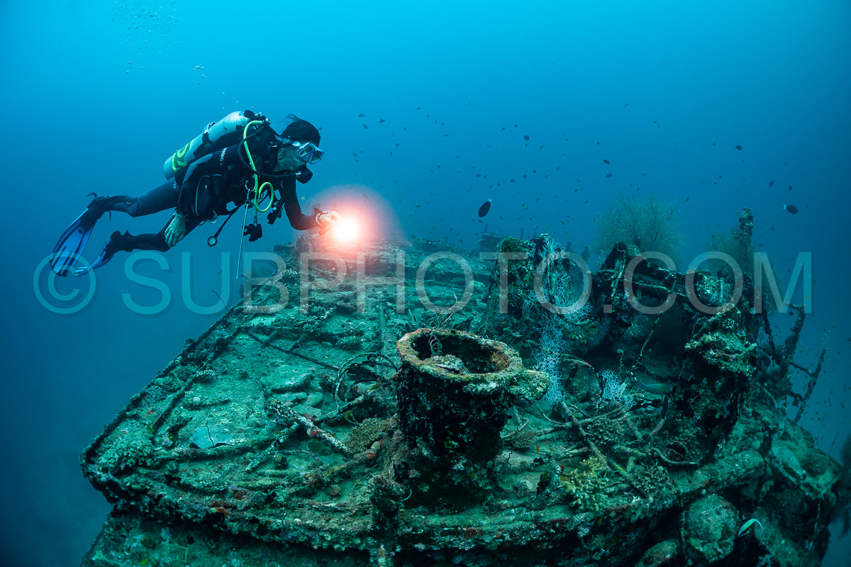 diver visiting a ship wreck in the Maldives