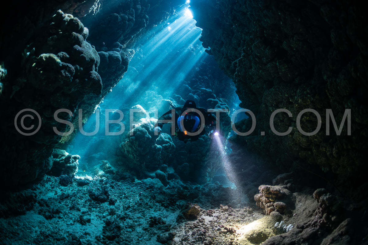Tek diver with a rebreather visiting Gota Jeny's cave Red Sea Egypt