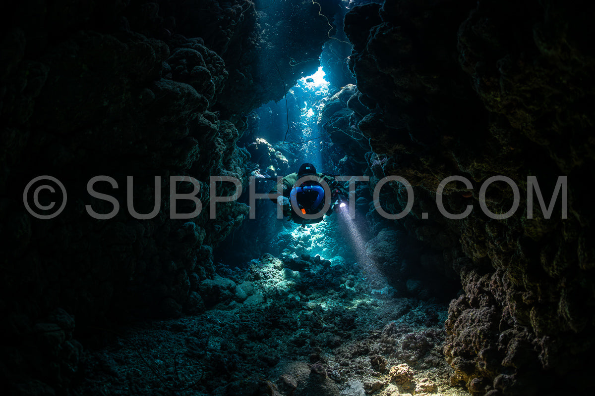 Tek diver with a rebreather visiting Gota Jeny's cave Red Sea Egypt