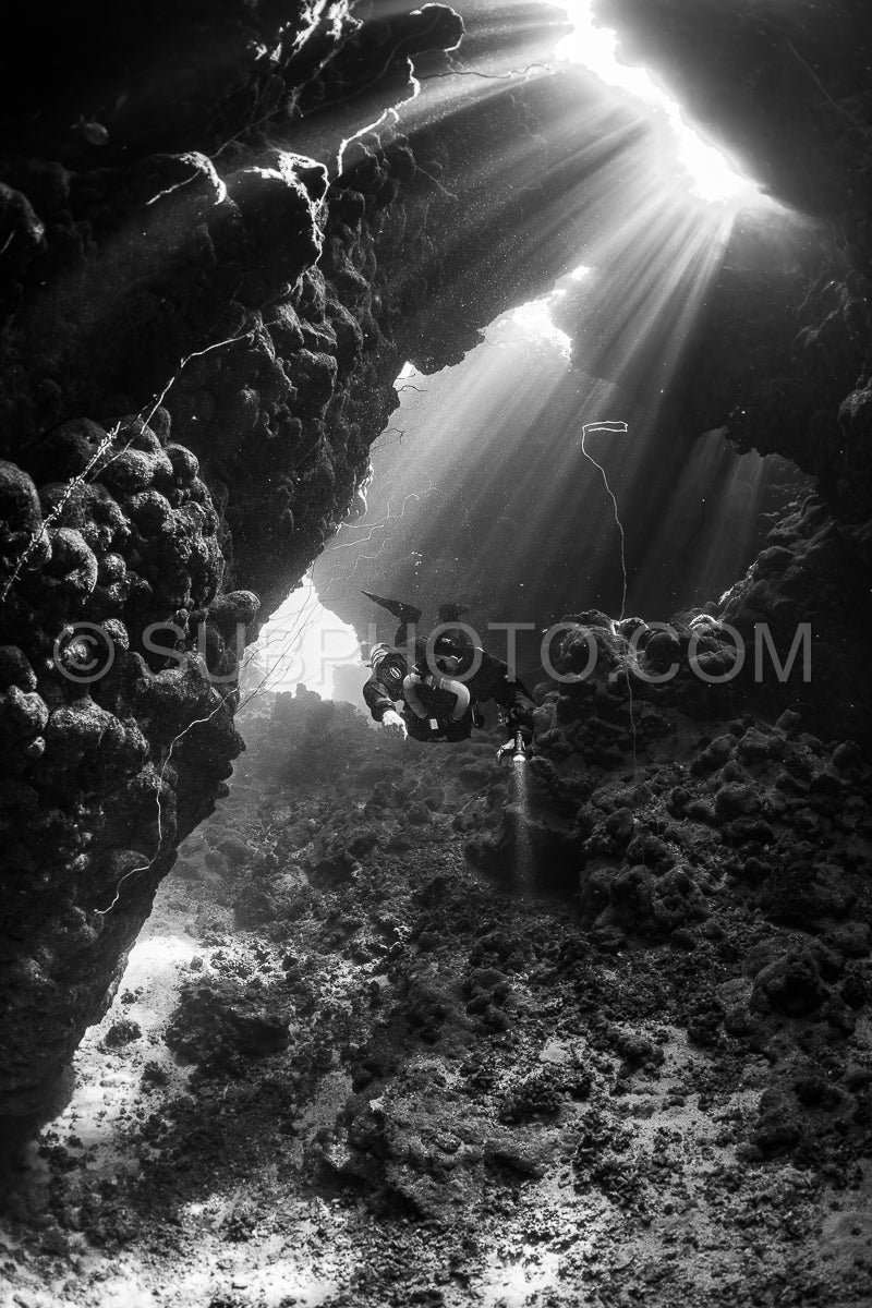 Tek diver with a rebreather visiting Gota Jeny's cave Red Sea Egypt