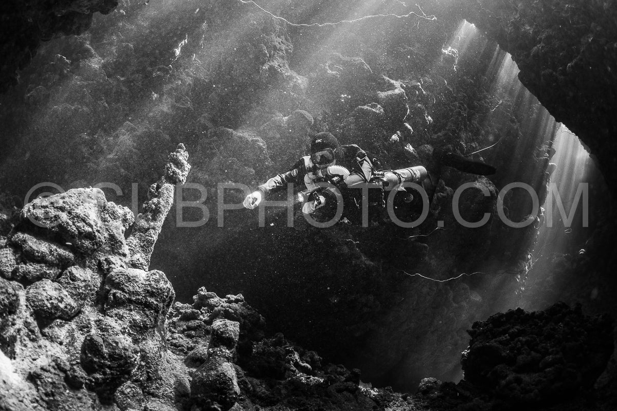 Tek diver with a rebreather visiting Gota Jeny's cave Red Sea Egypt