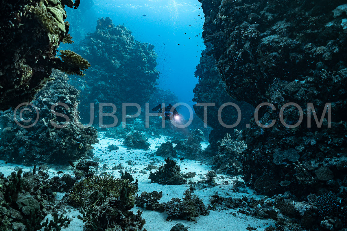 Tek diver using a rebreather discovering the majesty of coral structures in the Red Sea
