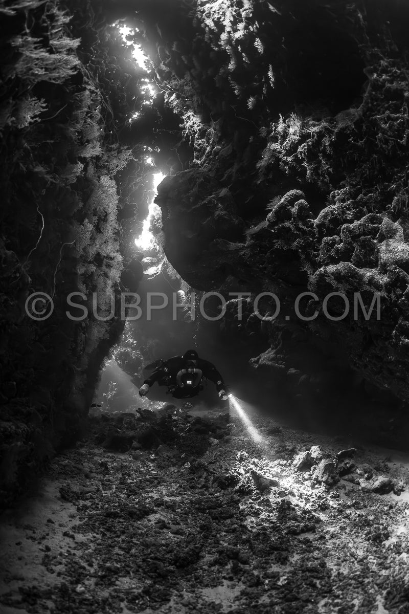 Tek diver with a rebreather visiting Saint John's cave Red Sea Egypt