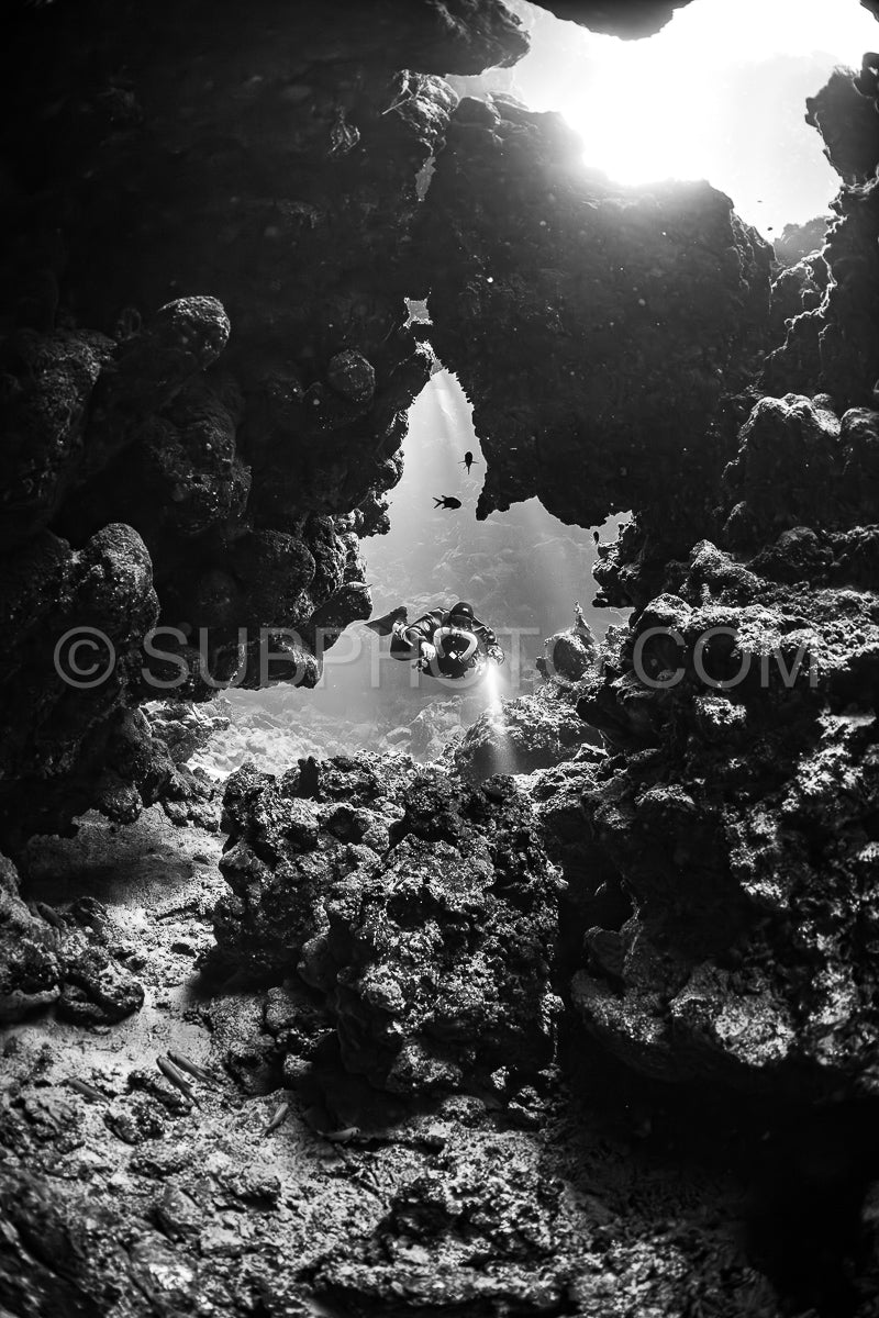 Tek diver with a rebreather visiting Sha'ab Claudio cave Red Sea Egypt