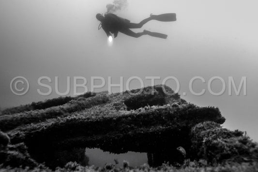 Diver in front of the Ville de Rochefort wreck in Brittany