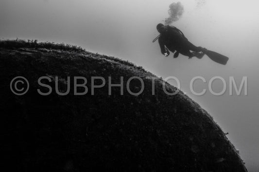 Diver in front of the Ville de Rochefort wreck in Brittany