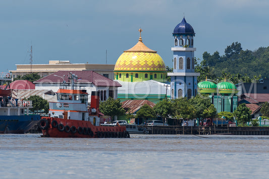 Tugboat in Berau in front of a mosque