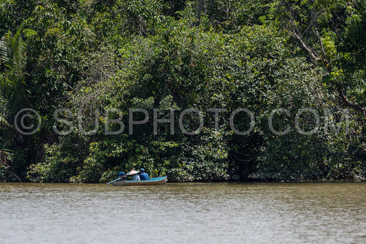 Wooden boat cruising Berau river- Borneo- Kalimantnan- Indonesia