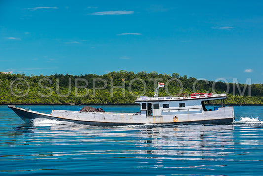 Wooden boat cruising Maratua coast- Borneo- Kalimantnan- Indonesia