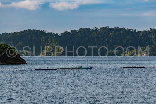 East Misool- group of small island with fishermen in shallow blue lagoon water- Raja Ampat- West Papua- Indonesia