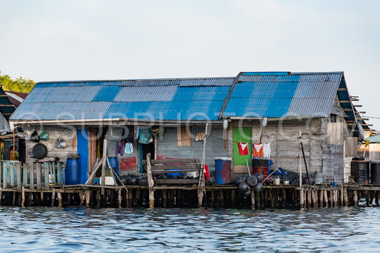 houses on stilts in Yellu village at sunset- east Misool- Indonesia