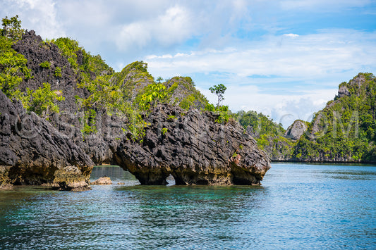 East Misool- group of small island in shallow blue lagoon water- Raja Ampat- West Papua- Indonesia