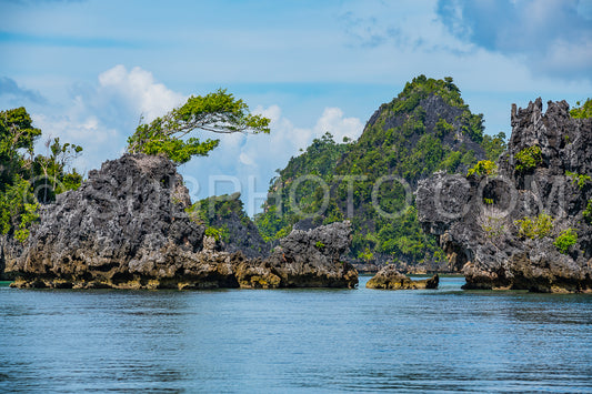 East Misool- group of small island in shallow blue lagoon water- Raja Ampat- West Papua- Indonesia