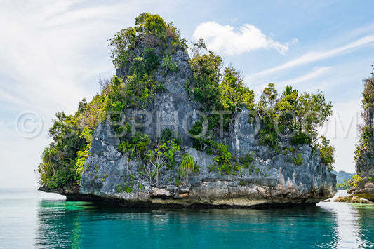 East Misool- group of small island in shallow blue lagoon water- Raja Ampat- West Papua- Indonesia