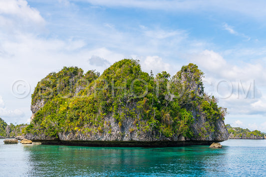East Misool- group of small island in shallow blue lagoon water- Raja Ampat- West Papua- Indonesia