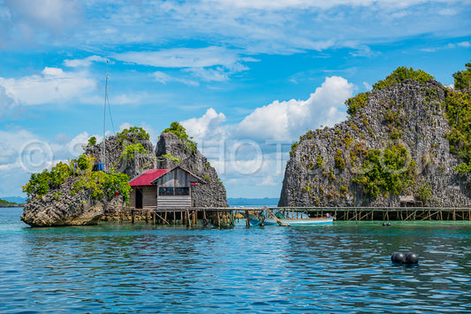 East Misool- group of small island in shallow blue lagoon water- Raja Ampat- West Papua- Indonesia