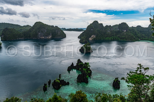 East Misool- group of small island in shallow blue lagoon water- Raja Ampat- West Papua- Indonesia