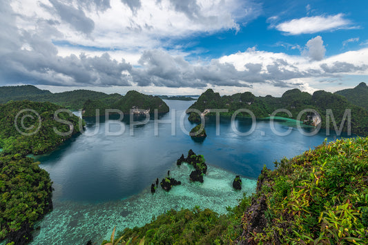 East Misool- group of small island in shallow blue lagoon water- Raja Ampat- West Papua- Indonesia
