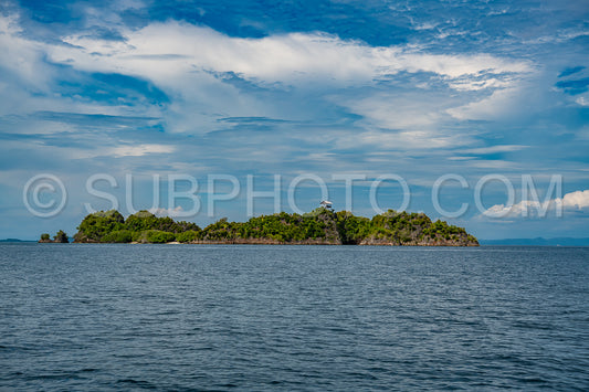 Waigeo- Kri- Mushroom Island- group of small islands in shallow blue lagoon water- Raja Ampat- West Papua- Indonesia