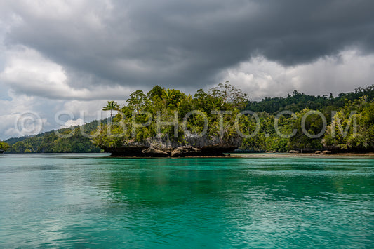 Waigeo- Kri- Mushroom Island- group of small islands in shallow blue lagoon water- Raja Ampat- West Papua- Indonesia