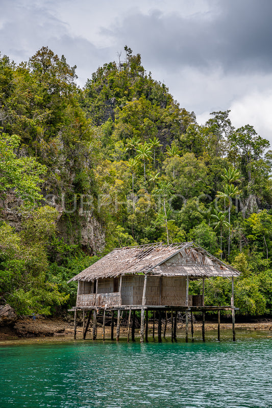Waigeo- Kri- Mushroom Island- group of small islands in shallow blue lagoon water- Raja Ampat- West Papua- Indonesia
