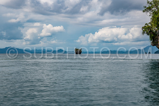 Waigeo- Kri- Mushroom Island- group of small islands in shallow blue lagoon water- Raja Ampat- West Papua- Indonesia