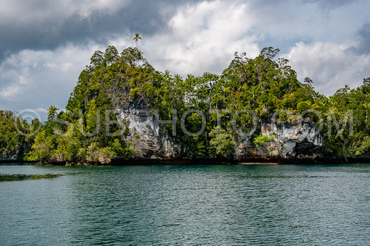Waigeo- Kri- Mushroom Island- group of small islands in shallow blue lagoon water- Raja Ampat- West Papua- Indonesia