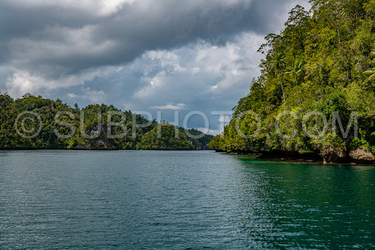 Waigeo- Kri- Mushroom Island- group of small islands in shallow blue lagoon water- Raja Ampat- West Papua- Indonesia