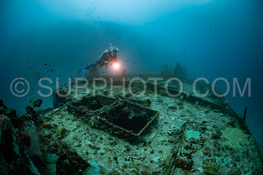 diver visiting a ship wreck in the Maldives