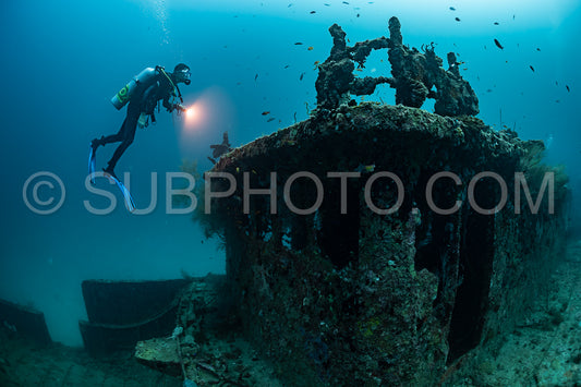 diver visiting a ship wreck in the Maldives