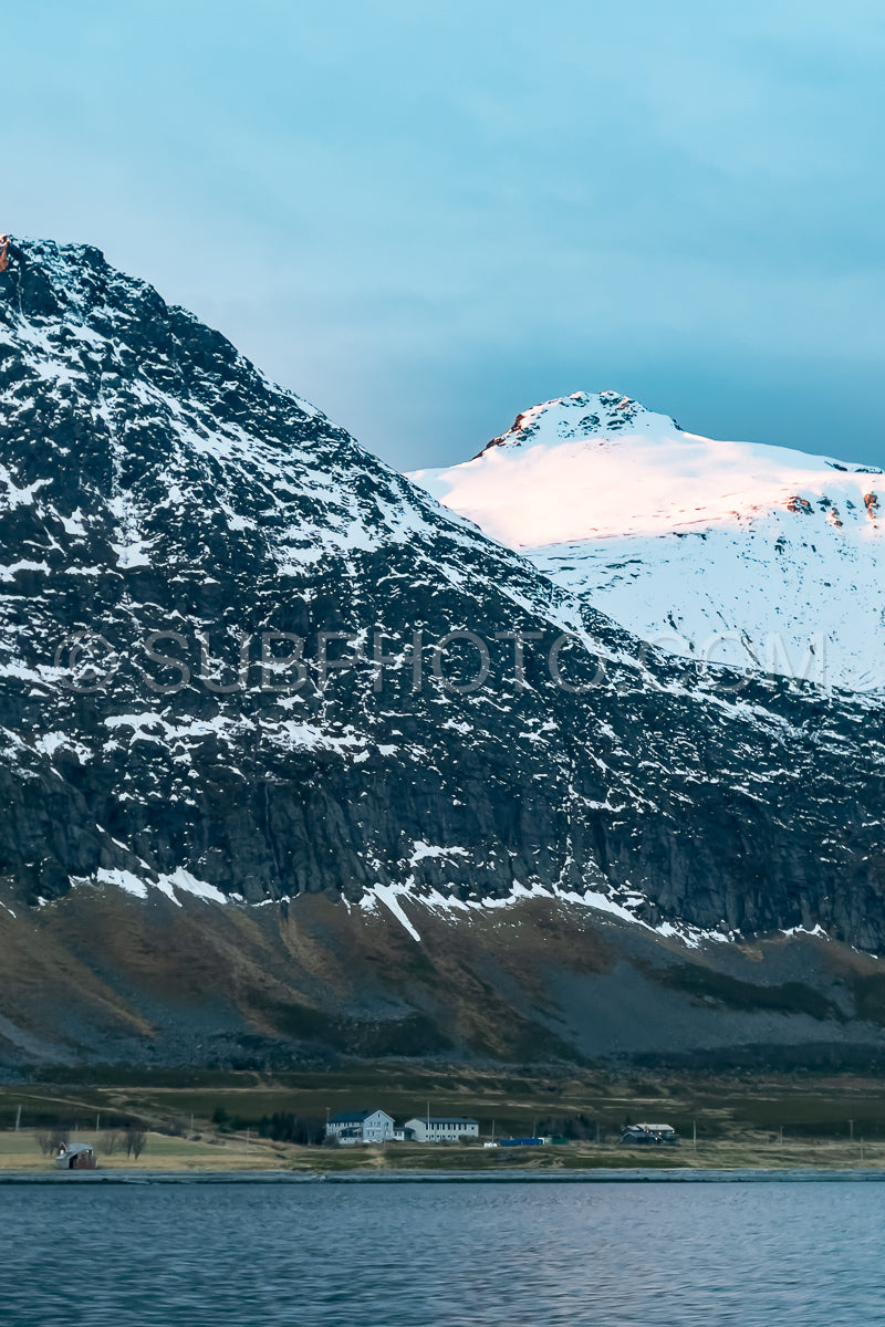 view of KvÃ¦nangen fjord from Seglvik village at dusk
