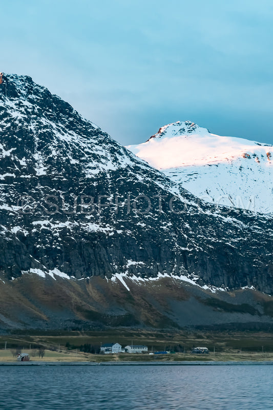 view of KvÃ¦nangen fjord from Seglvik village at dusk