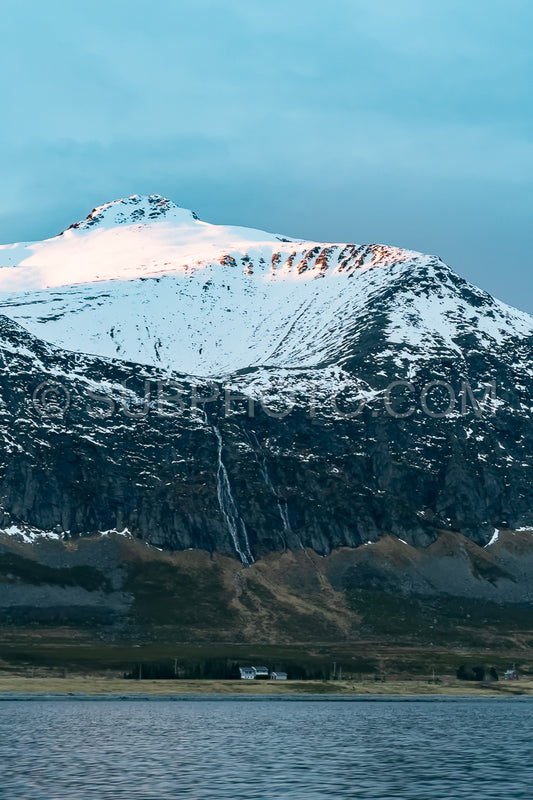 view of KvÃ¦nangen fjord from Seglvik village at dusk