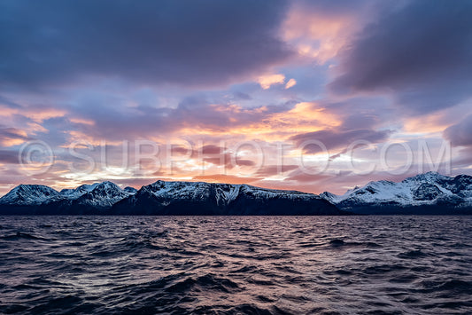 view of KvÃ¦nangen fjord from Seglvik village at dusk