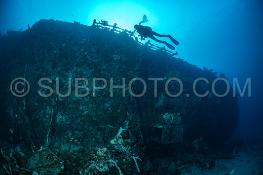 diver over a ship wreck in the Maldives